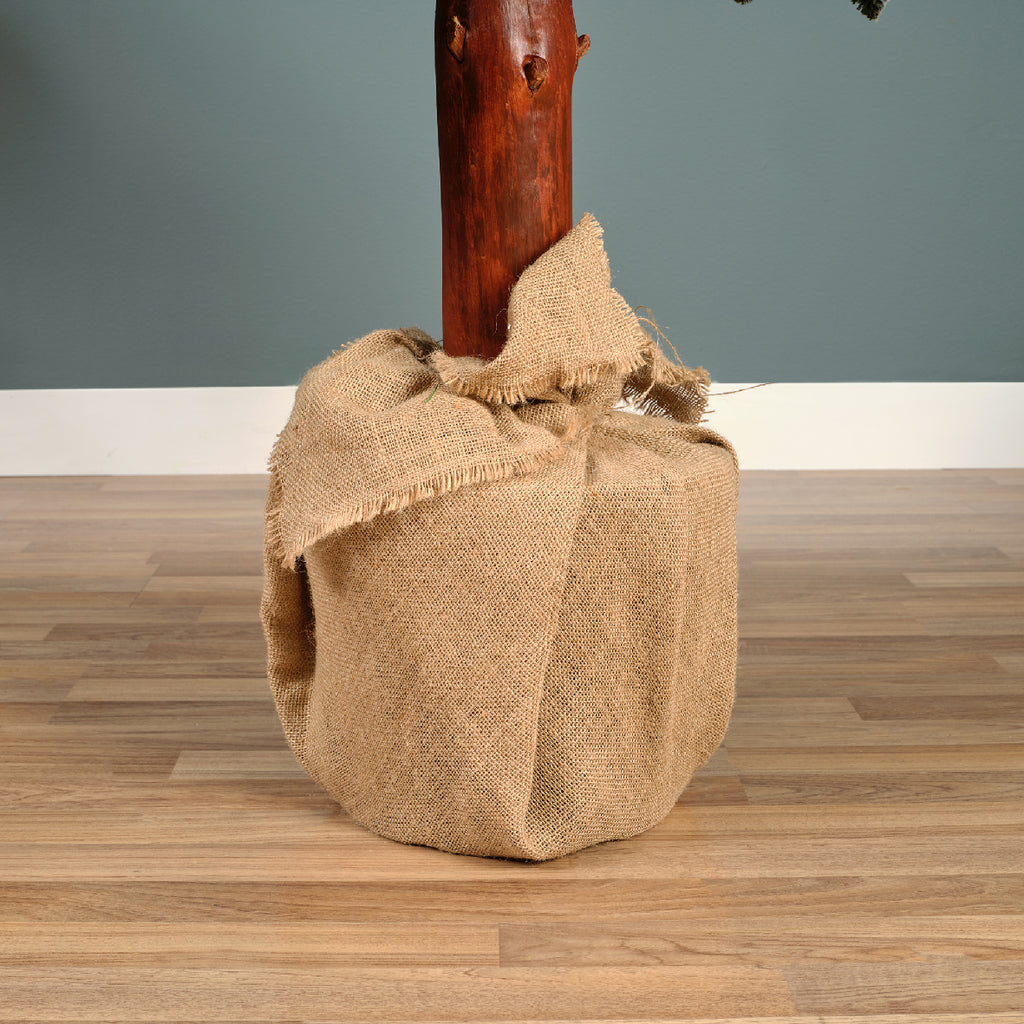 Snow‑tipped Tora Pine artificial Christmas tree (6 -7ft), realistic PVC needles with snowy finish, perfect for festive décor.