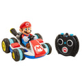 Toy race car with Mario character and remote control on a white background
