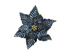 Decorative blue poinsettia flower with gold center on a white background