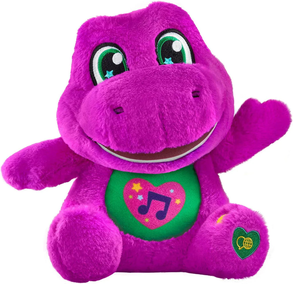 Purple plush toy with green heart and music note design on a white background