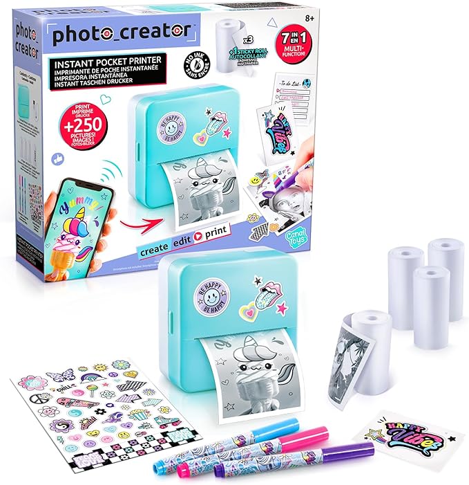 Photo Creator instant pocket printer with packaging, printer, ink cartridges, and printed photos on a white background.