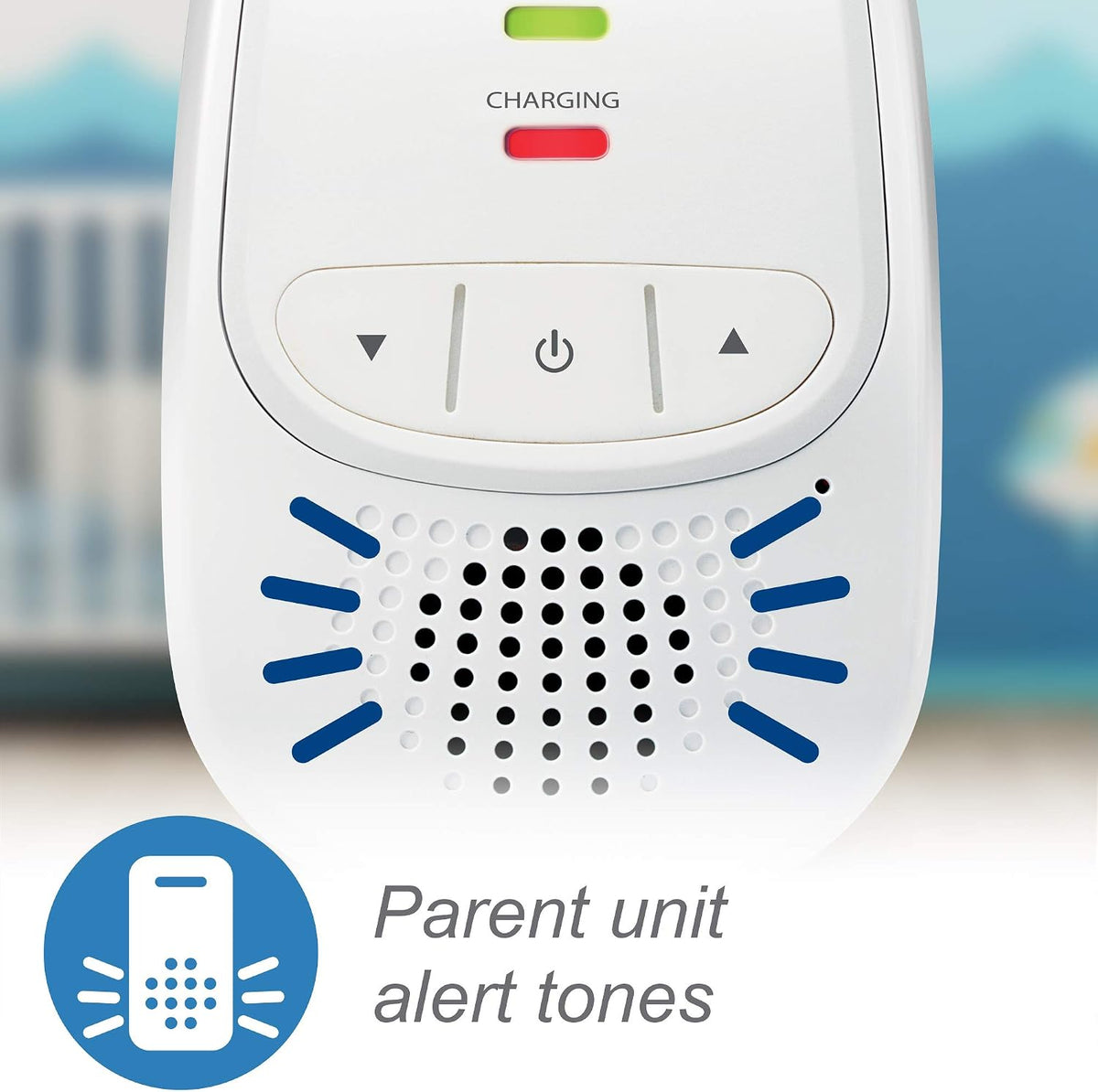 White electronic device with buttons and indicator lights, labeled 'Parent unit alert tones', on a blurred background.