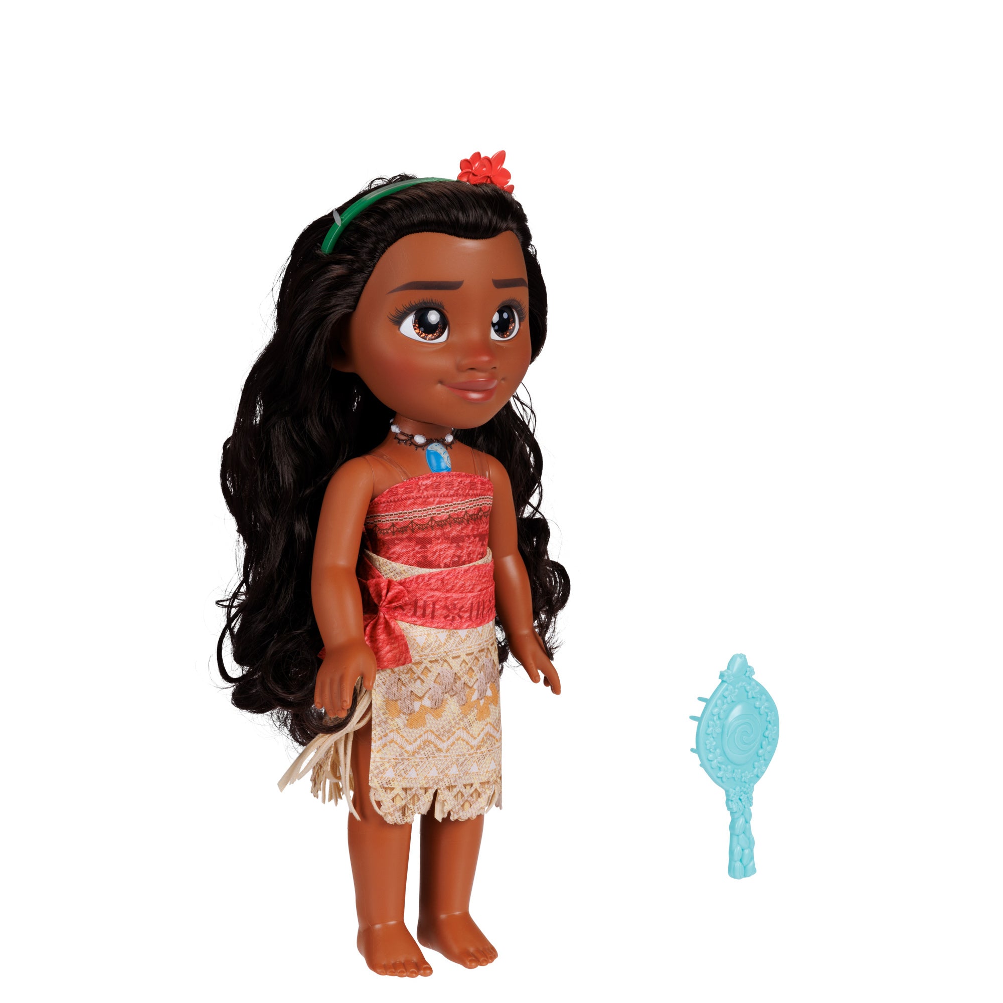 Doll with long dark hair and traditional outfit on a white background