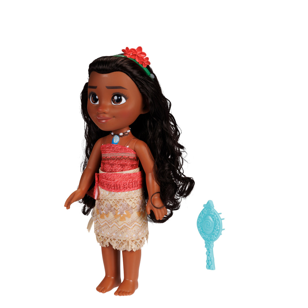Toy doll with long dark hair and a colorful outfit on a white background