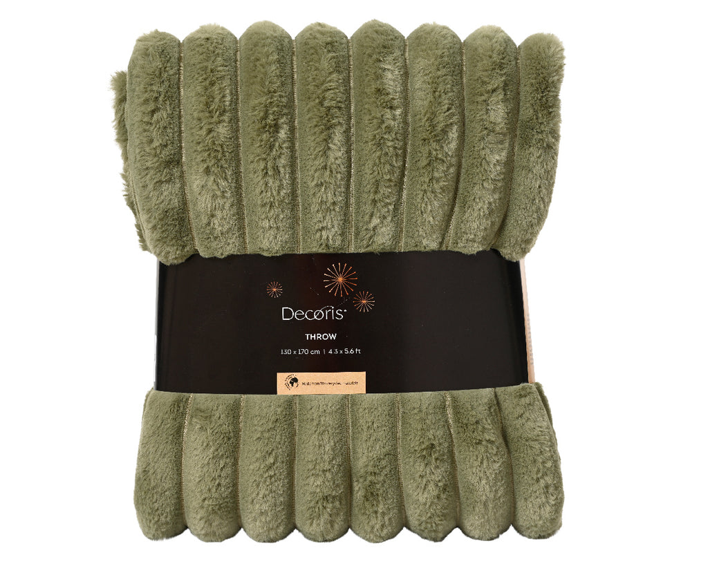 Green throw blanket with Decors label on a white background