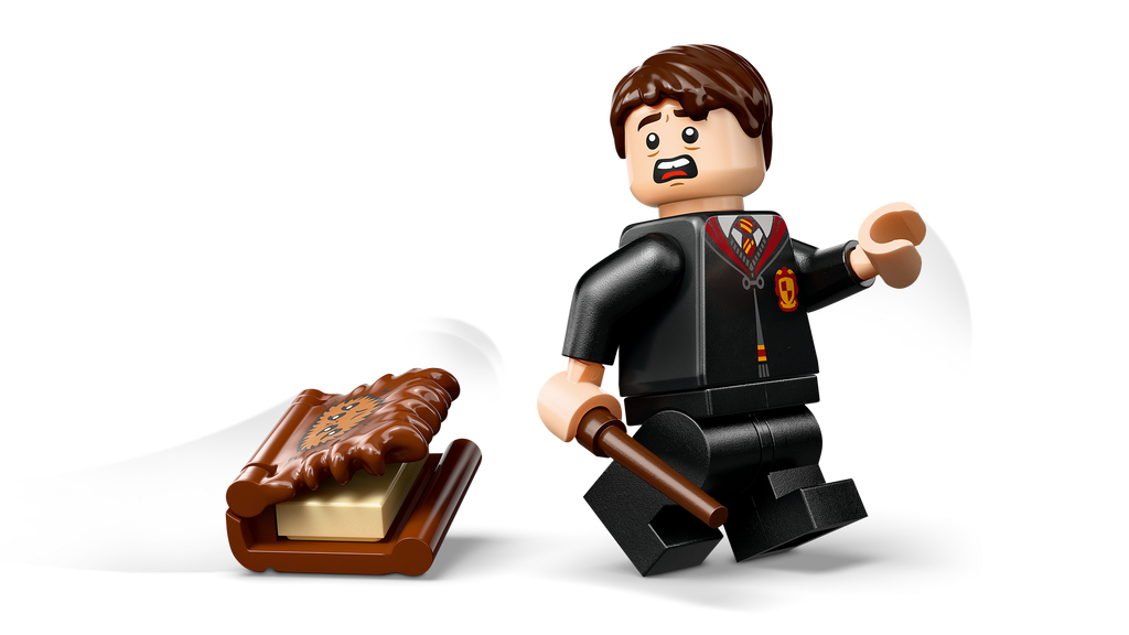 LEGO minifigure of a man in a suit with a tray of pastries on a white background