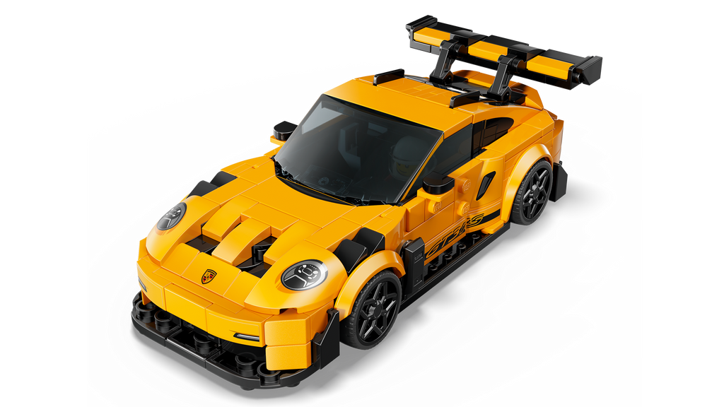 Yellow toy sports car with black details on a white background