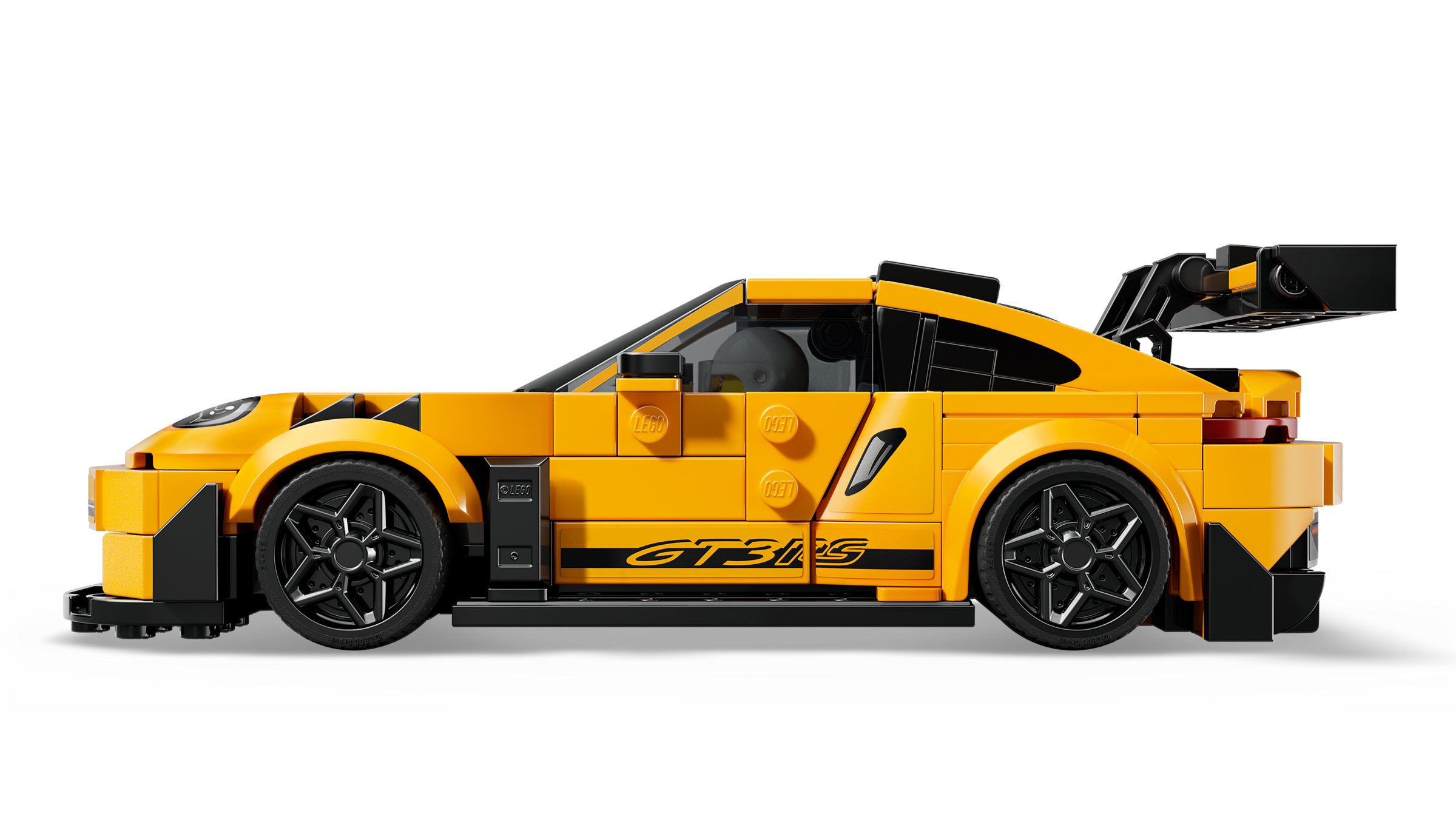 Yellow sports car model made of interlocking bricks on a white background