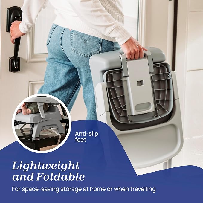 Person holding a foldable pet carrier with anti-slip feet feature, suitable for space-saving storage.