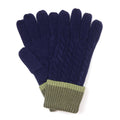 Pair of navy blue gloves with green cuffs on a white background