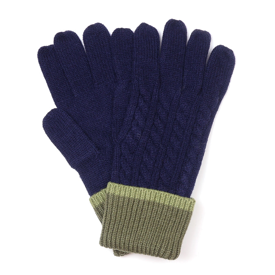 Pair of navy blue gloves with green cuffs on a white background