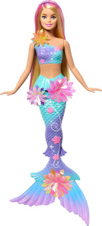 Barbie mermaid doll with a colorful tail and floral decorations on a white background