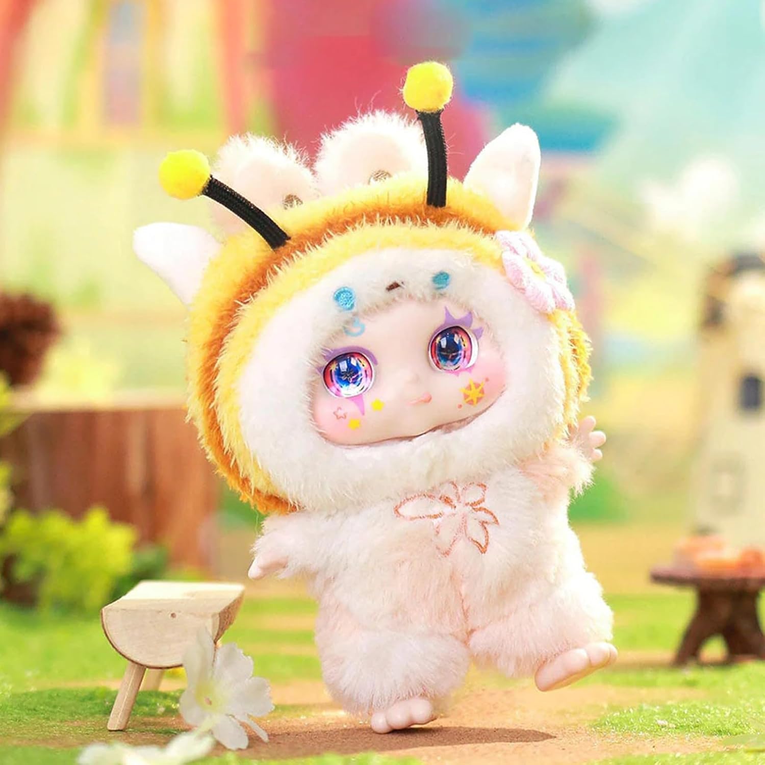 Plush toy with bee costume in a colorful outdoor setting
