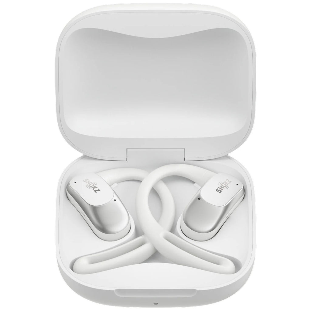 White wireless earbuds in a charging case on a white background
