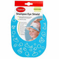 Clippasafe Shampoo Eye Shield bath mat in bright blue with white ocean-themed illustrations, shown in its retail packaging with a red header card and a photo of a child wearing the product.
