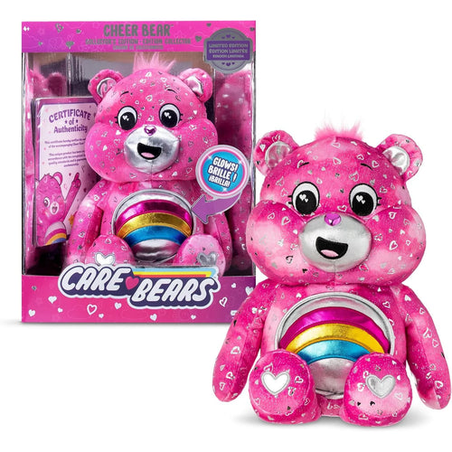 Pink toy bear with rainbow inside packaging and visible 'Care Bears' branding