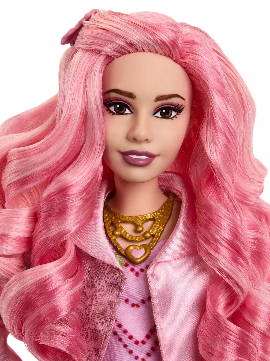 Close-up of a doll with pink hair and pink outfit on a white background