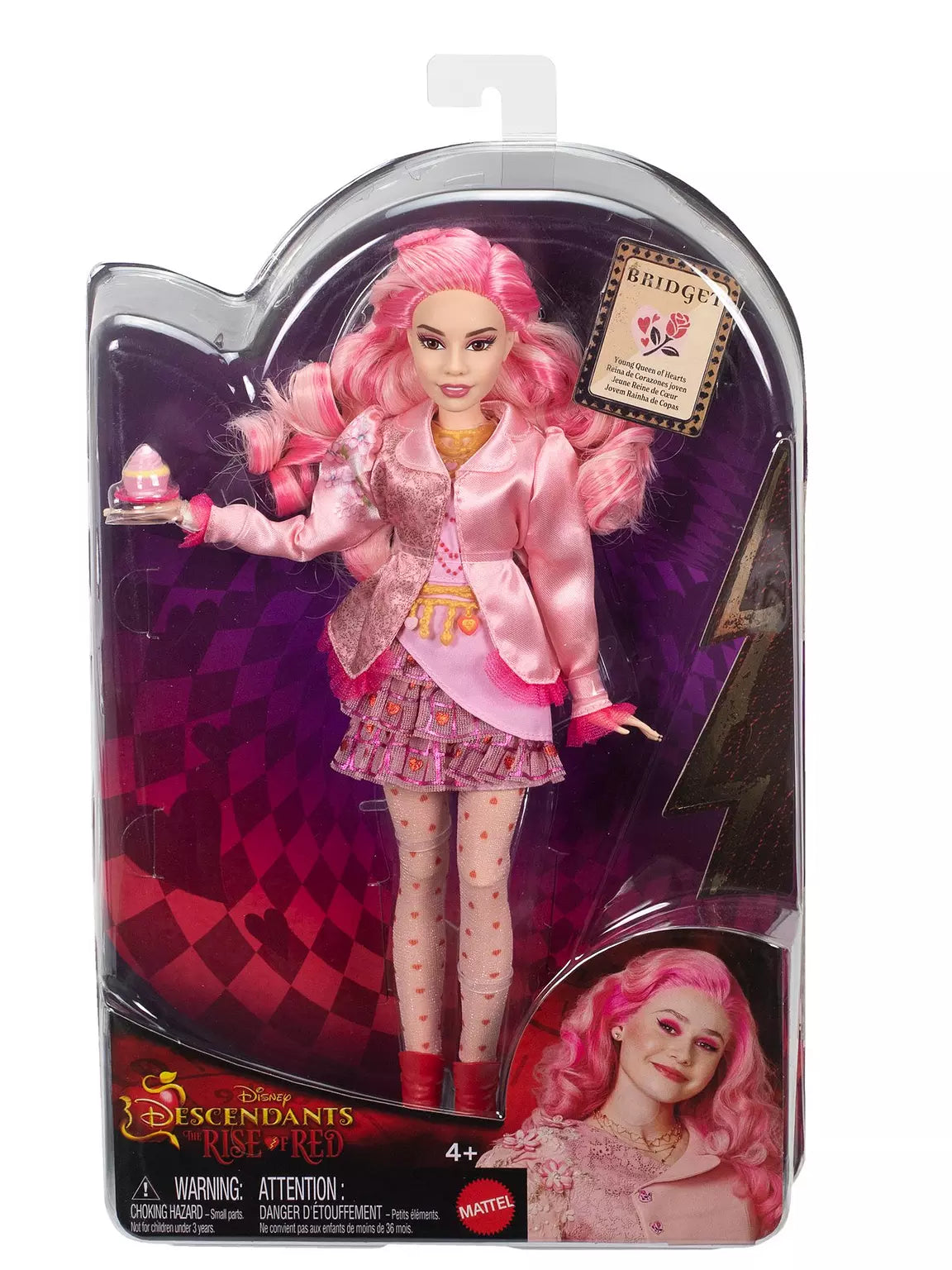 Toy doll with pink hair and outfit in packaging, featuring Disney Descendants branding.