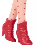 Red high-heeled boots worn with patterned tights on a white background