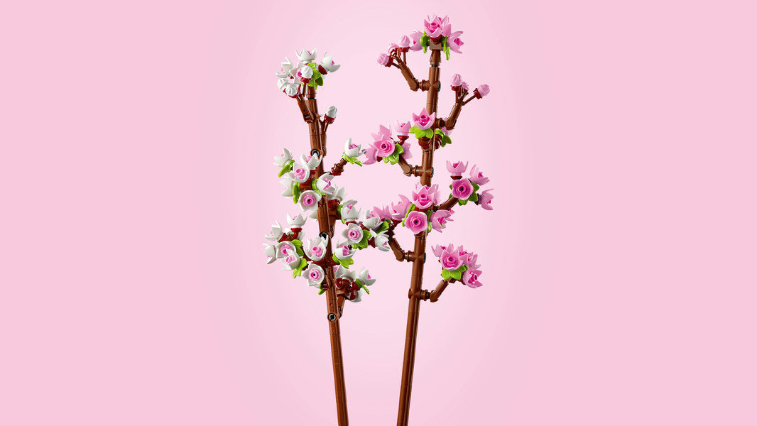 LEGO Decorative cherry blossom branches with pink and white flowers on a pink background