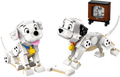 Two toy dogs made of interlocking bricks with a small TV in the background.