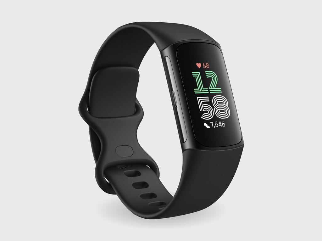 Black fitness tracker on a light gray background