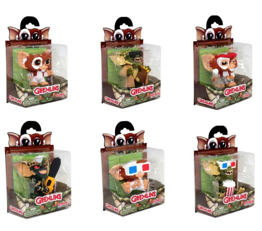 Set of six Gremlins action figures in packaging on a white background