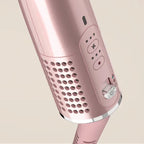 Close-up of a pink hair curler on a beige background