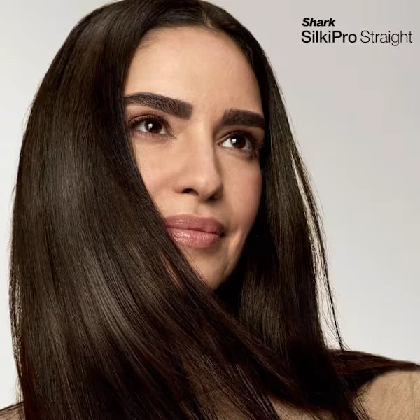 Woman with straight, shiny hair, featuring the Shark SilkiPro Straight product.