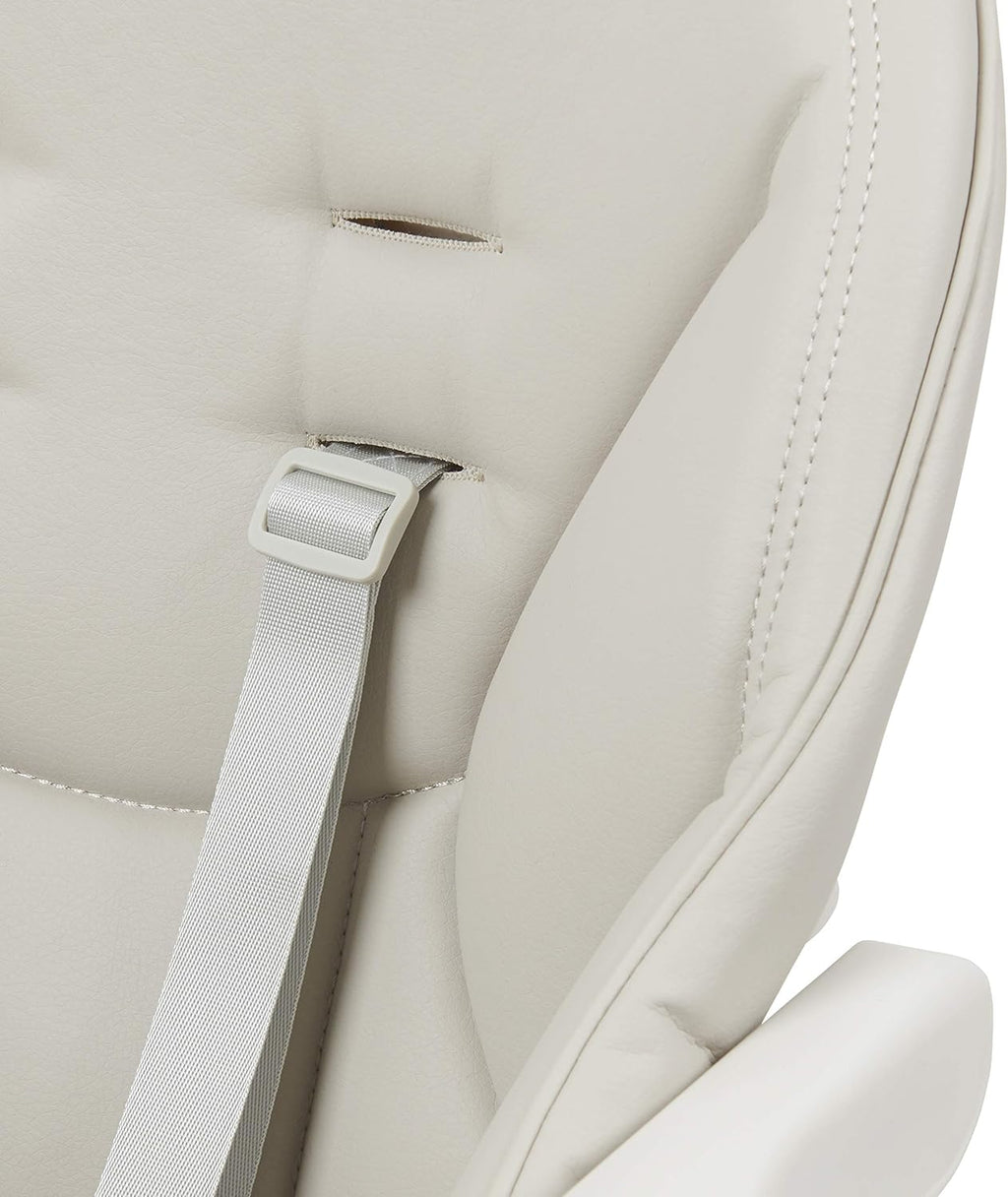 Close-up of a beige Nosh highchair with a harness