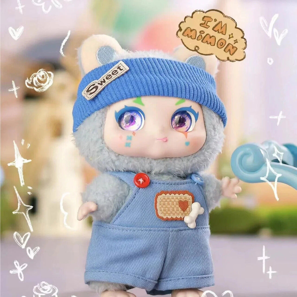 Toy figure with blue outfit and hat, surrounded by decorative elements.