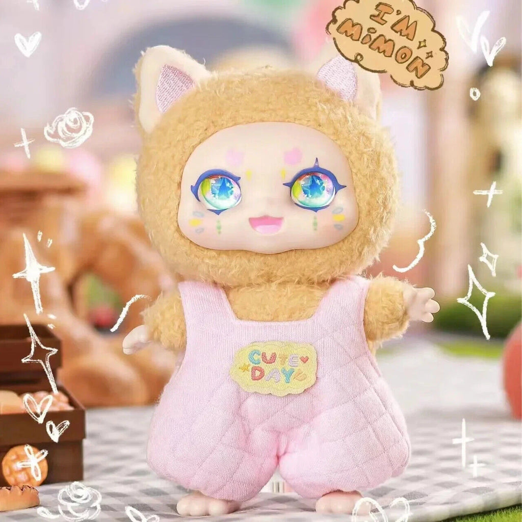 Toy figure with cat ears and a pink outfit, standing on a surface with a blurred background.