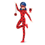 Toy figure in a red and black polka dot outfit with a small figure on a white background
