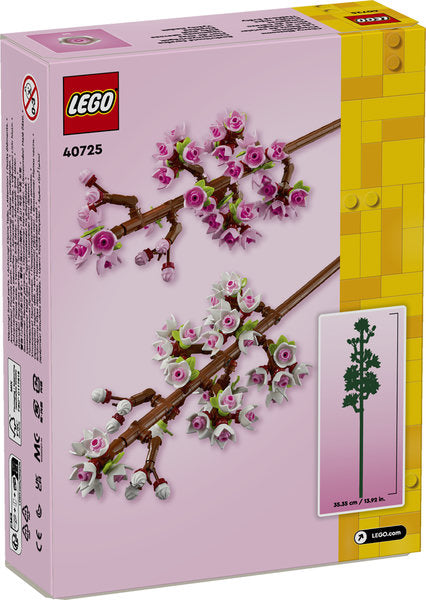 LEGO set packaging with cherry blossom branches on a pink background