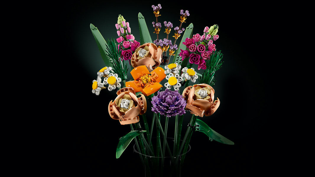 Colorful bouquet of flowers with decorative elements on a black background