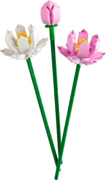 Three LEGO flowers, two pink and one white, on green stems against a white background.