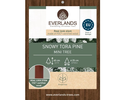 Snow‑tipped Tora Pine artificial Christmas tree, realistic PVC needles with snowy finish, perfect for festive décor.