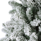 Snow-dusted artificial Christmas tree with realistic frosted branches, sturdy stand—available in 6 ft, 7 ft, and 8 ft sizes