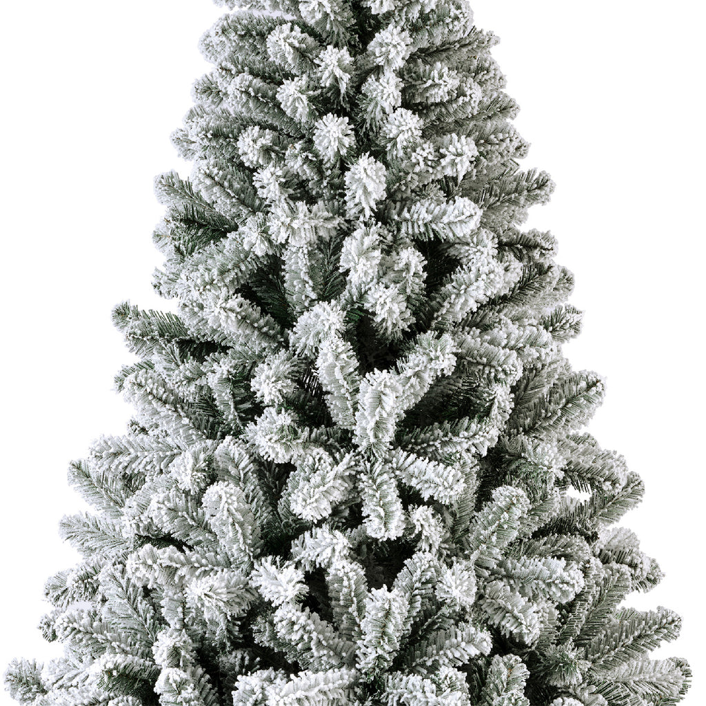 Snow-dusted artificial Christmas tree with realistic frosted branches, sturdy stand—available in 6 ft, 7 ft, and 8 ft sizes