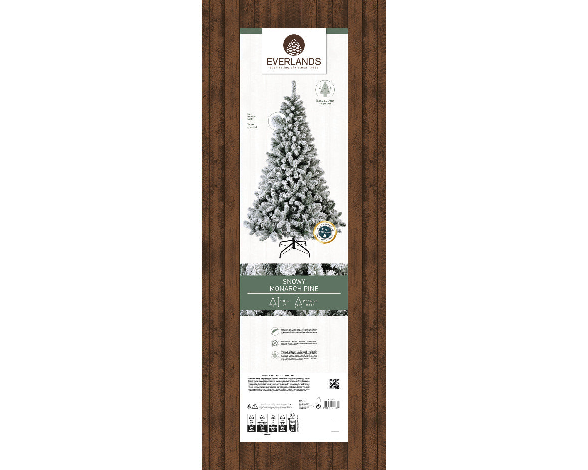 Snow-dusted artificial Christmas tree with realistic frosted branches, sturdy stand—available in 6 ft, 7 ft, and 8 ft sizes