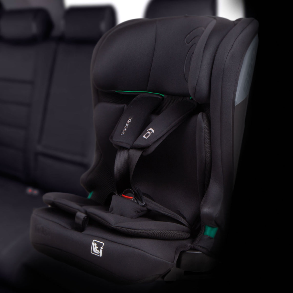 A black infant car seat with a five-point harness, shown installed on a car seat in a vehicle interior. The brand name 'Bebamour' is visible on the shoulder strap.