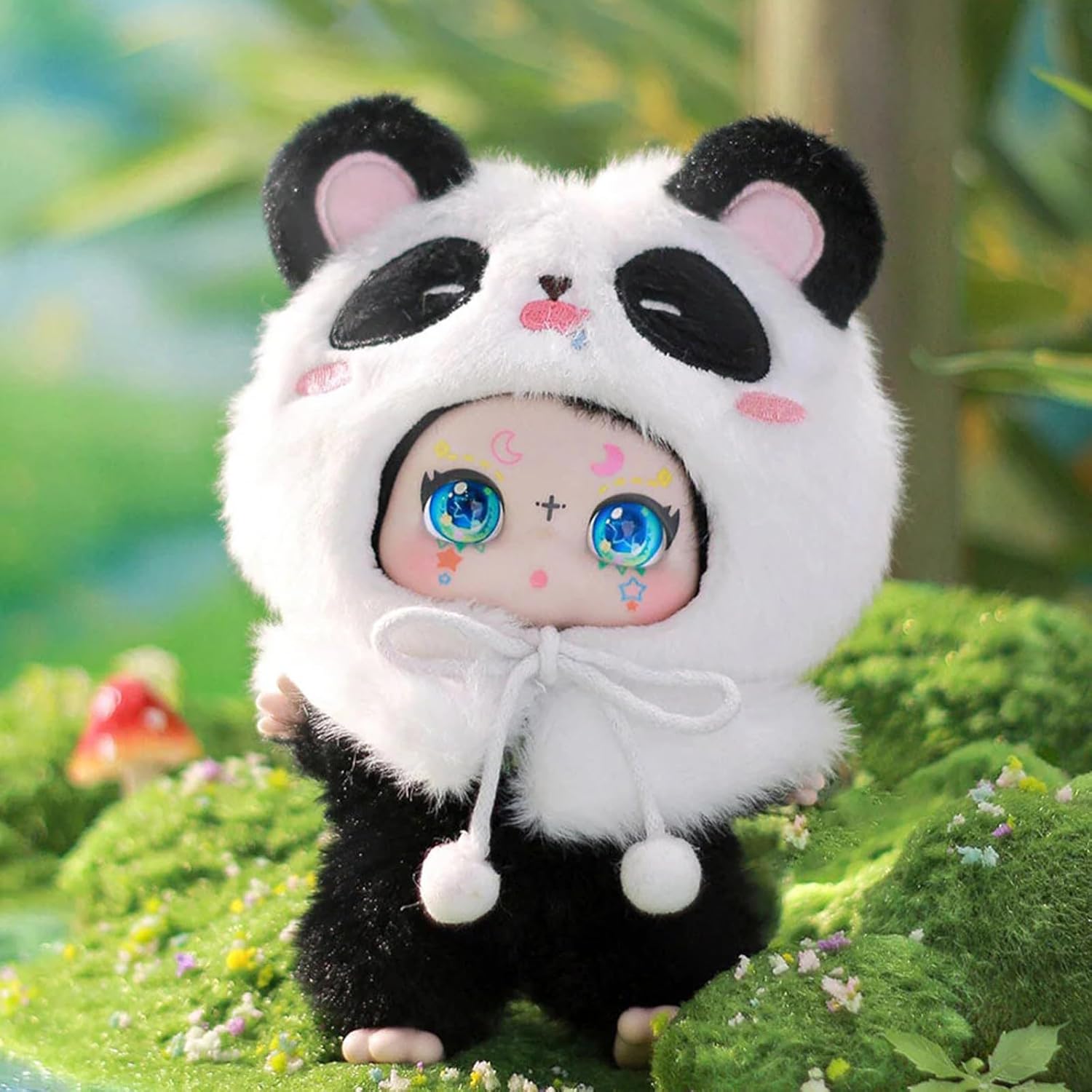 Plush toy panda with cartoon face on a green background