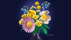 Colorful floral arrangement in a vase on a dark background