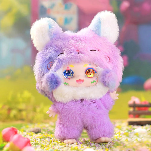 Plush toy with colorful fur and large eyes in a garden setting