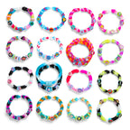 Assorted colorful bracelets on a white background