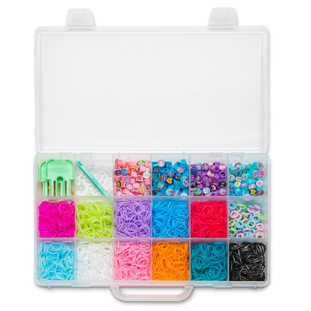 Clear organizer box with colorful rubber band assortment and tools on a white background