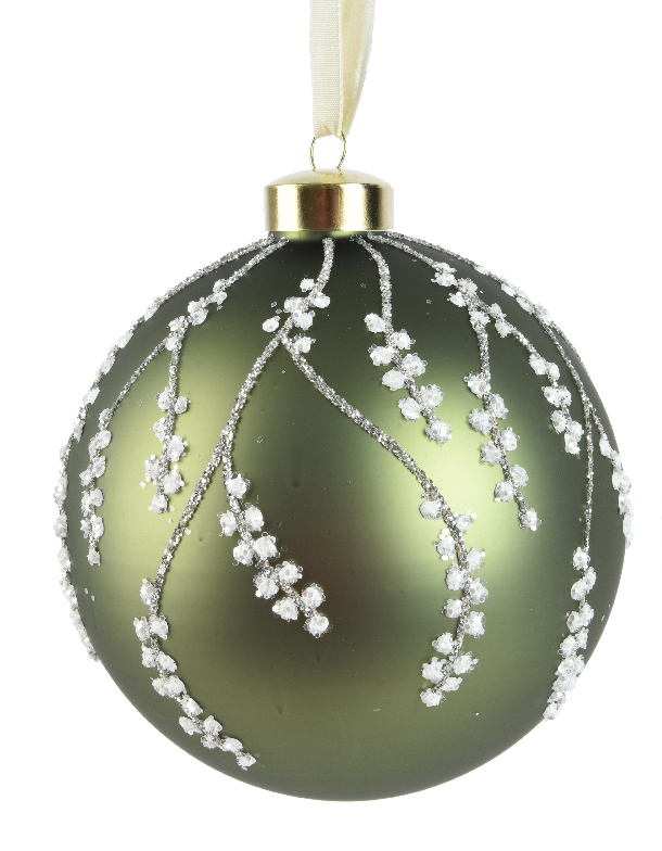 Decorative green Christmas ball ornament with white floral patterns on a white background