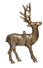 Decorative gold reindeer figure on a white background