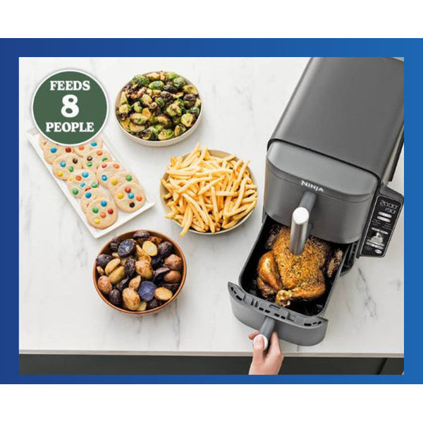 Open air fryer drawers showing cooking chicken