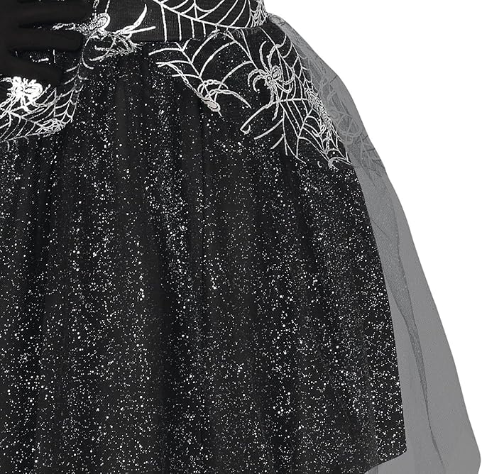 Black glittery dress with spider web and spider designs on a white background